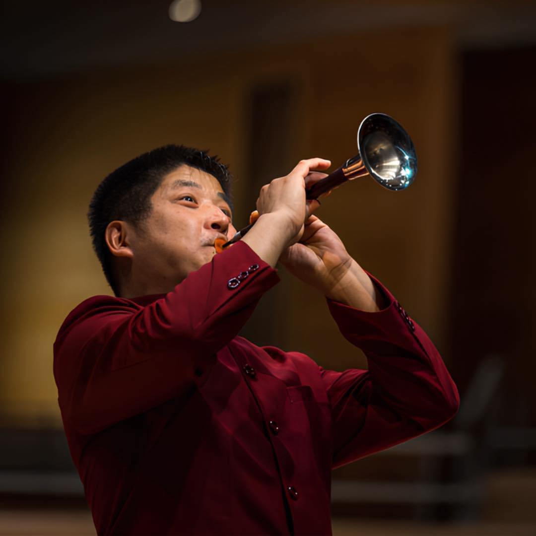 Zhongxi plays the suona